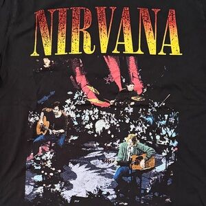 NIRVANA Black Tee with Yellow-to-Red Gradient Logo and Multicolor Stage Graphic